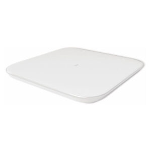 White Xiaomi Mi Smart Scale 2 digital body weight scale on a clean floor